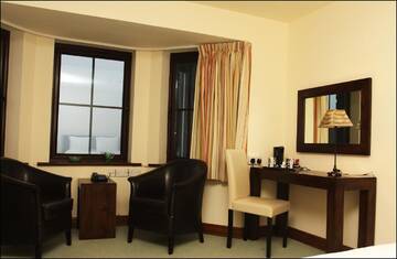 Фото номера Номер с кроватью размера «king-size» Гостевой дом All the Twos Lodge г. Клифден 4